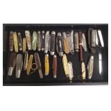 Group of pocket knives, fountain pen, etc