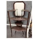 Antique small etagere with beveled mirror