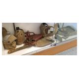 Group of military items including shovels,
