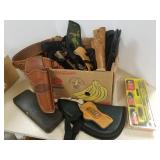 Group of assorted holsters, pistol cases & gun
