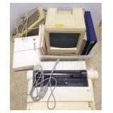 Vintage Macintosh computer with monitor printer,
