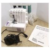 New Home HF504D serge sewing machine