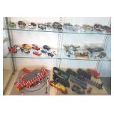 Group of assorted trains, die cast cars, etc.