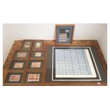 Group of framed stamp replicas