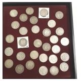 21 assorted U.S. silver dollars