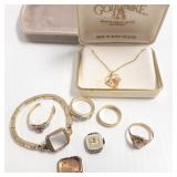 Group of gold rings & a watch, etc.- some diamonds