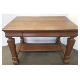 Antique oak library table with drawer