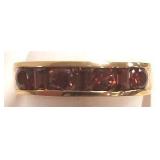 10k gold ring set with 4 garnets