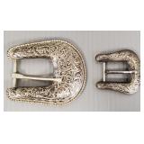 2 belt buckles: signed Renalde sterling & a