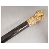 Antique cane with ornate gold filled top w/