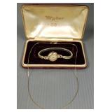 Ladies watch in 14K gold case & 14K chain (chain