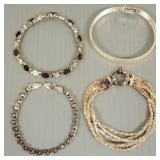 4 asst. N.O.S. sterling silver bracelets incl.