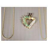 2- 14K gold fine chains- 1 with sterling & emerald