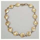14K gold shell motif bracelet- 6.4g; 7 1/2'L