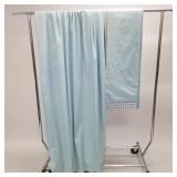 Pair blue cotton drapery panels with checkered