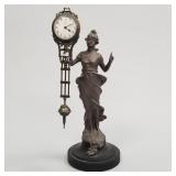 Junghans figural free swinging clock- 13 1/2'H 5'W