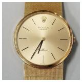 Rolex Cellini 18K yellow gold watch with champagne