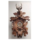 Black Forest style carved wood cuckoo clock w/ two