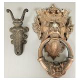 Large figural metal door knocker & cast iron boot