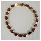 14K gold bracelet s/w garnets- 7.6g; 7'L
