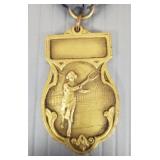 Vintage 1928 women's tennis tournament medal-