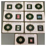 7 U.S. Walking Liberty silver 1/2 dollars on cards