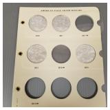 4 U.S. American Eagle silver dollars:  2010, 2011,