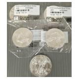 5 U.S. American Eagle silver dollars: 2- 2014; 3-