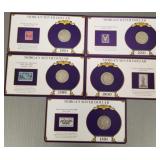 5 Morgan U.S. silver dollars on cards w/