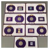 7 Morgan U.S. silver dollars on cards w/