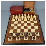 2 carved wooden chess sets in wooden boxes-