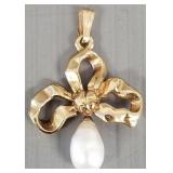 14k gold bow pendant w/ pearl- 2.6g, 1'L