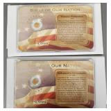 Two .5g- 585 gold miniature tribute coins