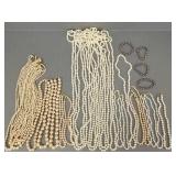 29 NOS pearl necklaces & 4 NOS bracelets