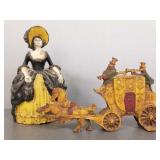 2 vintage cast iron doorstops: lady w/ bonnet &