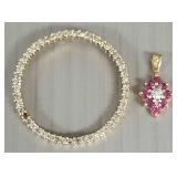 2- 10K gold pendants s/w diamonds, etc.- 5.1g