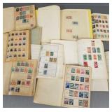 10 small stamp albums w/ vintage stamps incl
