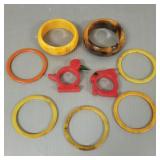 9 pcs bakelite, etc. bangles, napkin rings, etc.