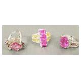 3 sterling silver rings set with pink stones: