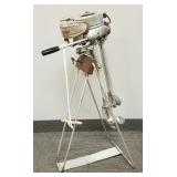 Antique Sea King 1 HP outboard motor on stand