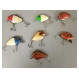7 Heddon Punkinseed lures- 2 1/2' longest