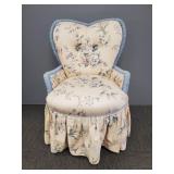 Vintage upholstered boudoir chair with heart back-