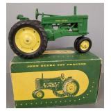 Vintage John Deere tractor w/ steel wheels &
