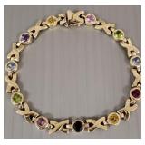 14k gold bracelet s/w multi-colored stones-