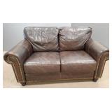 Divani leather upholstered loveseat- 62'W 34'H