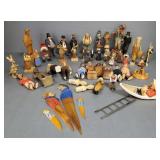 Over 40 hand carved wood figures incl Swiss,