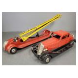 2 metal trucks: windup 'Firechief' 14'L &