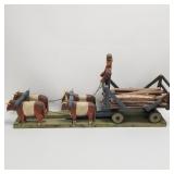 Vintage Folk Art wooden log wagon with oxen on