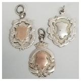 3 antique English sterling silver shield fobs: