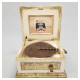 Regina coin operated music box with 4- 15 1/2'
